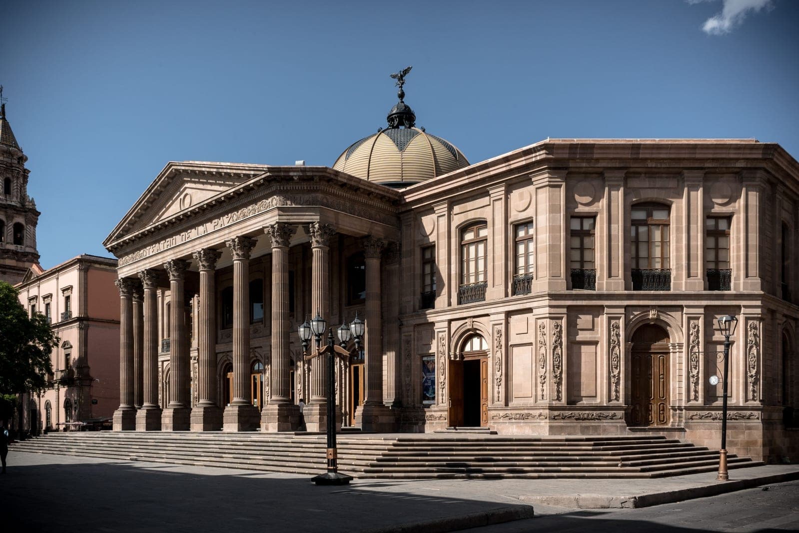 Exterior view of the historic Teatro de la Paz in San Luis Potosi, Mexico, showcasing its neoclassical architecture.